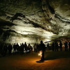A National Park Ranger guiding visitors on a tour of Mammoth Cave.