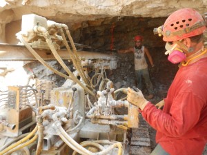 Cavers Rand Heazlitt and Ryan Cox drilling in the tunnel, which will soon open into Big Bone Mountain room of Indiana Caverns