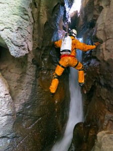 Caver Andy McKenzie climbing in Peru's Cueva Jadibamba