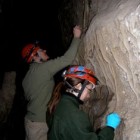 Folks cleaning Lehman Cave in Nevada's Great Basin National Park.