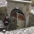 Bob Bruninga at the Carmichael Entrance with the walkie talkie in one hand and in the foreground, one of the black-box relays.