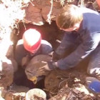 Cave diggers excavating the entrance to Tamarisk 320 Cave.