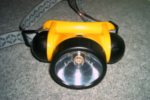 A Bright Yellow Head Lamp.