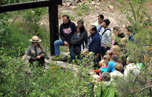 A rangers lead visitors on a tour at Wind Cave National Park.