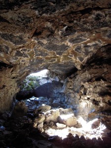 Sunlight filters into Lava Beds National Monument's Blue Grotto Cave.