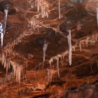 Formations following cracks on the ceiling inside Dan yr Ogof.