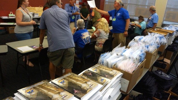 Packets for pre-registered attendees are ready to be handed out.
