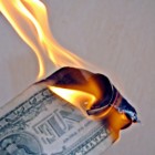A burning dollar bill.