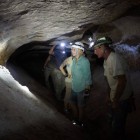 Penny (second from right) discusses microbial activity within Blowing Hole Cave to students and members of The Karst Conservancy.