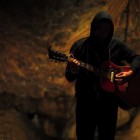 Irish singer songwriter Mick Flannery inside Mitchelstown Cave.