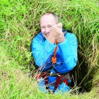 Border Watch journalist and qualified cave diver Leon Rademeyer enters the Shaft sinkhole.