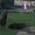 The hole appeared overnight after snow had fallen.