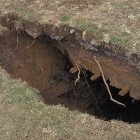 A sinkhole that appeared in the backyard of a home in Lebanon, Pennsylvania. Photo via abc27.com