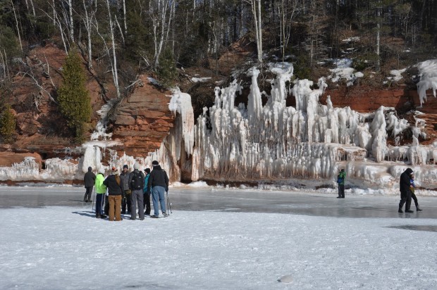 Visitors view the ice caves at Apostle Islands National Lakeshore in Wisconsin.