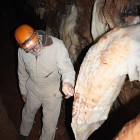 Jonathan Beard, vice president of the Missouri Caves & Karst Conservancy pointing out vandalism inside Missouri's Crystal Caverns.