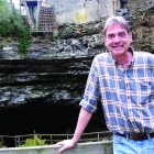 The American Cave Conservation Association Director Dave Foster in front of Hidden River Cave.