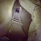Cavers explore the lower level of Colorado's Cave of the Winds.