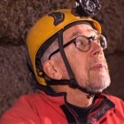 Caver Peter Crossley inside a lava tube.