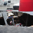 The car devouring sinkhole inside the National Corvette Museum.