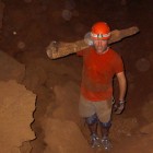 Rhawn Denniston, professor of geology at Cornell College, with one of the stalagmites that helped create a record of tropical cyclones going back more than 2,000 years.