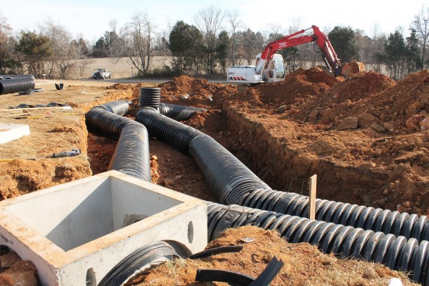 Laying the pipes that will make the cavern. 
