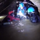 Rescuers with injured cave diver.