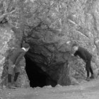 Schoolboys of the 1890s explore the famous hermit cave.
