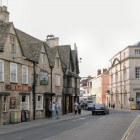Old stone buildings on Cirencester's Castle Street.
