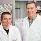 Graduate student Daniel Raudabaugh, left, and mycologist Andrew Miller, of the Illinois Natural History Survey, found a naturally produced compound that inhibits the fungus that causes white-nose syndrome in bats.
