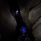 Descending inside Tennessee's Hang Em’ High Cave.
